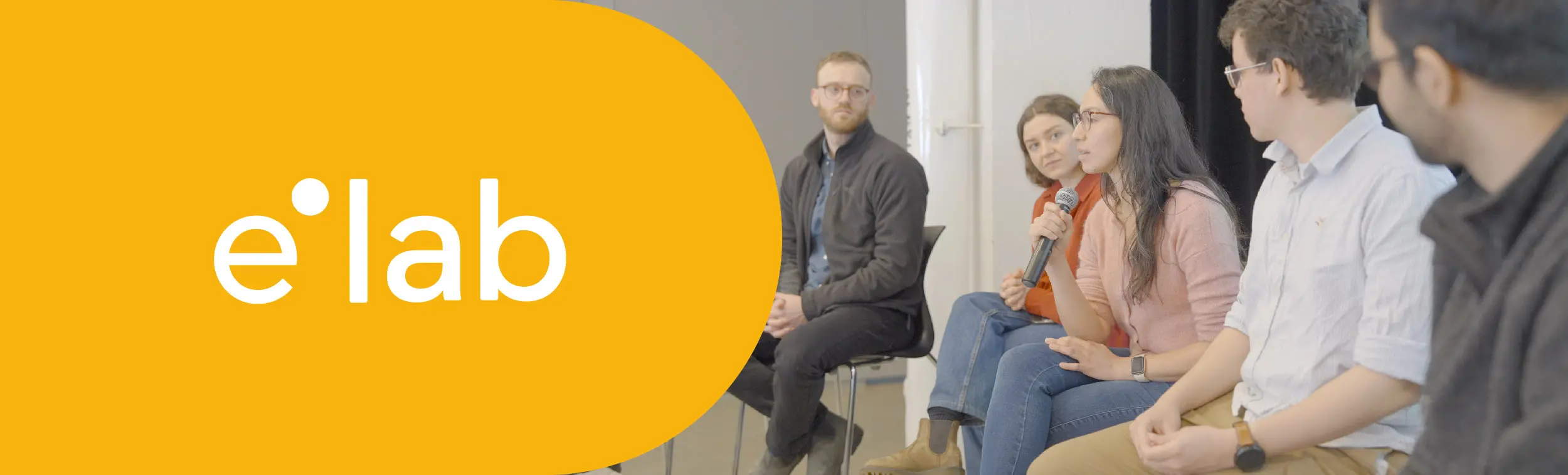 Logo of the elab with a picture of some participants of the entrepreneurship lab during pitch day
